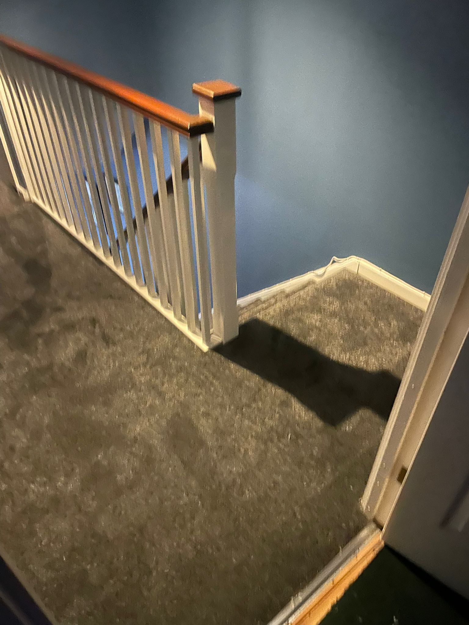 Grey carpet fitted on landing with staircase