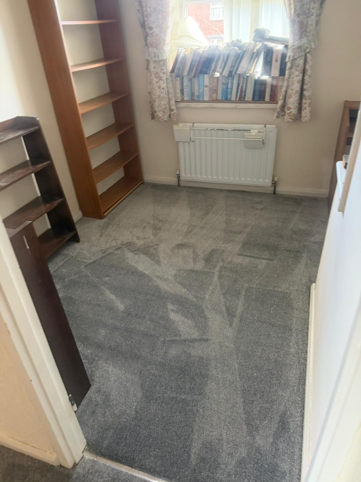 Grey carpet fitted in bedroom